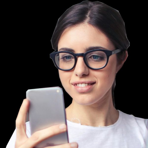 A woman using her phone with a happy face